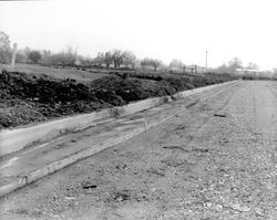 Street and curb grading in Rincon Valley Homes subdivision in the Mission Blvd.-Yukon Drive area