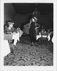 Hooded coat modeled in the "Dramatic Moods" fashion show in the Topaz Room, Santa Rosa, California, 1959