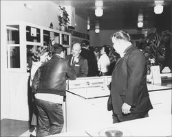 Robert Fountain talks to open house attendees at The Washing Machine Man, Santa Rosa, California, 1965