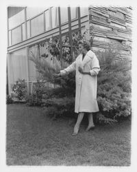 Long white coat modeled in the Dramatic Moods of Autumn fashion show, Santa Rosa, California, 1959