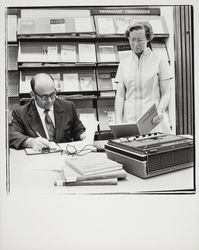 Winifred Swanson and Eugene Kravis in the veterinary section of the Library, Santa Rosa, California, 1971