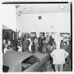 Attendees mingle at the Zumwalt Chrysler-Plymouth Center Open House, Santa Rosa, California, 1971