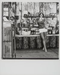 Apple Blossom Queen Julie Pimental posing with apple products, Sebastopol, California, 1977