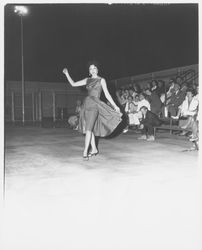 Jonelle Johnson, Miss Marysville-Yuba City, modeling a tunic dress and capri ensemble in the Aqua Varieties fashion show at the Swim Center, Santa Rosa, California, 1959