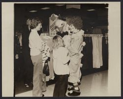 Clown and his puppet at Sears opening day, Santa Rosa, California, 1980