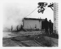 Burning down buildings in 2900 block of 4th Street, Santa Rosa, California, 1957