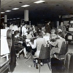 String quartet playing at Sears opening day celebration, Santa Rosa, California, 1980