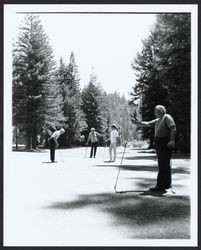 Playing golf at Northwood Golf Course, Monte Rio, California, 1968