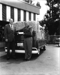 Weight guess winner at Veale Motor Co., Santa Rosa, California, 1961