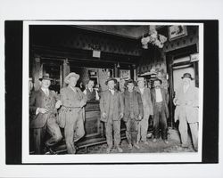 Seven men at the bar of an unidentitied Santa Rosa saloon