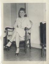 Ruby Levin seated in armchair