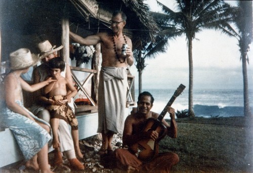 Walter Munk, with his wife Judith Horton Munk and daughters Kendall and Edie, in the fale the family lived in while on American Samoa