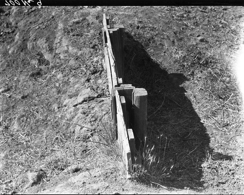 End view of single wall field gate showing failing condition after having been reinforced with posts. University Farm, Davis