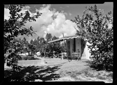 Ferguson, George W., residence [Hacienda del Bosquito]. Exterior, Garden and Swimming pool