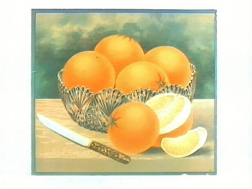 Stock label: glass bowl of oranges with knife