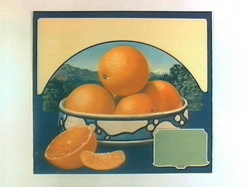 Stock label: blue and white ceramic bowl of oranges