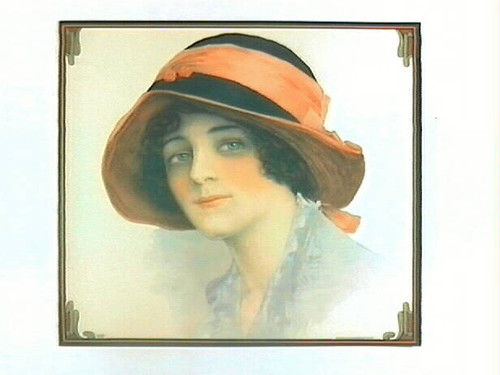 Stock label: woman wearing a pink and black hat
