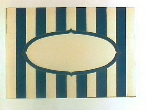 Stock label: oval text panel over vertical stripes