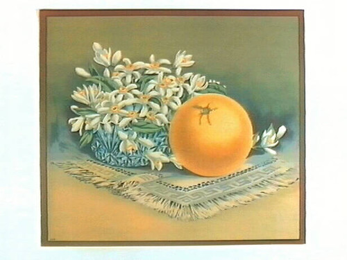 Stock label: orange and glass bowl of flowers on placemat