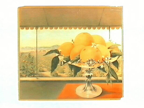 Stock label: oranges in glass bowl with orchards