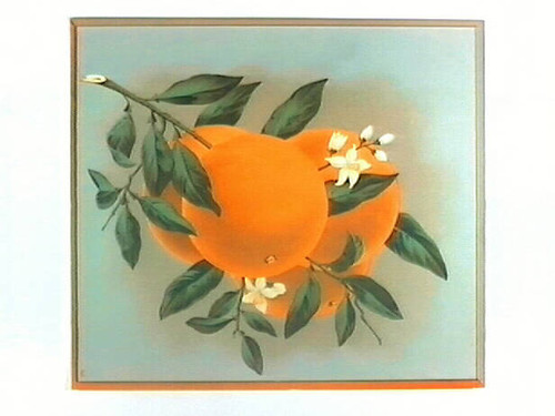 Stock label: oranges on branch with leaves and blossoms