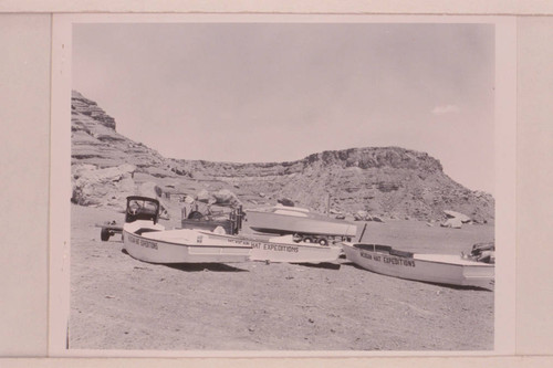 Portion of the Wright-Rigg fleet at Art Greene's Cliff Dweller's Lodge before launching at Paria Riffle
