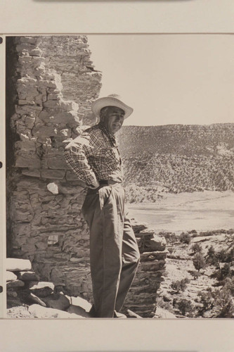 F. E. Masland at ruin in Marsh Pass