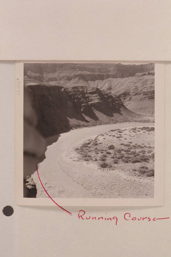 Unkar Rapid at [as] approximately 60,000 cfs. water runs through boulders on beach [ink notation on photo: Running Course]