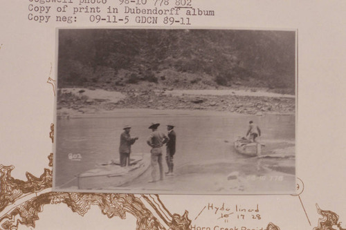 Julius Stone talking with the packer and Mr. J. H. Fleming after they had brought supplies down the Bright Angel Trail and delivered them to the Galloway-Stone party at the mouth of Pipe or Garden Creek