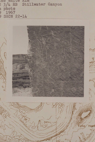 Prehistoric drawings on second large boulder at foot of talus below the White Rim; Mile 22 3/4 right bank, Stillwater Canyon