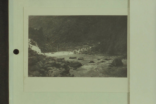 Lava Cliff Rapid looking upstream. 40 rocks exposed. The water is ...