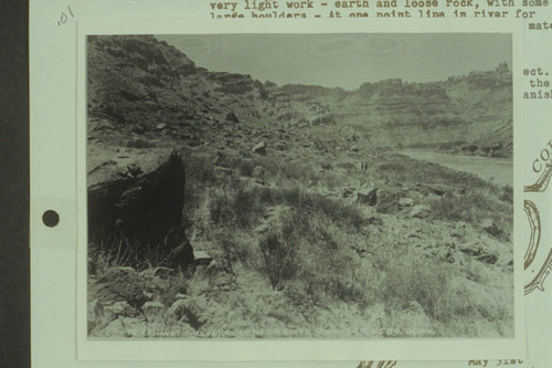 43.Station 8589 Down. Brown-Stanton party. Station 8589 would be at Mile 214.7 and caption is correct. At upper center is uplift from Paradox Formation at mouth of Butler Canyon. Land of Standing Rocks and Spanish Bottom are right