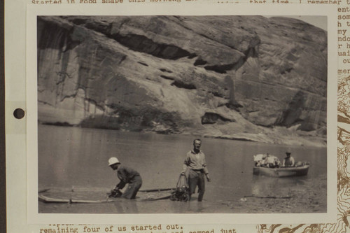 Swamped boat after it was secured from submerging while under tow and had lost its cargo of grub, utensils and water pail. Print from negative in Waller collection