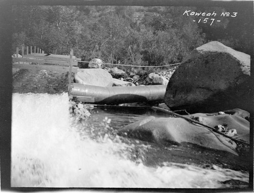 Bypassing Middle Fork over the siphon pipe at Kaweah #3 Hydro Plant