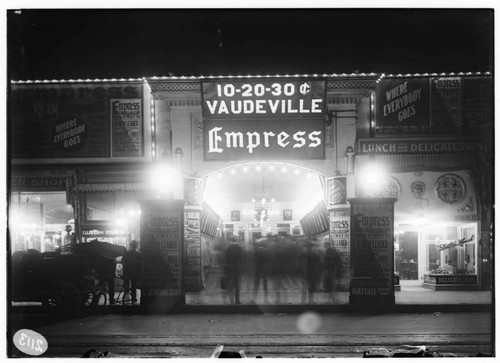 L1.3 - Lighting, stores - A night photo of the Empress Theater