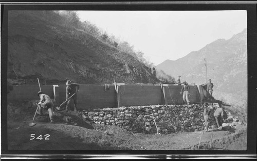 Men repairing the storm damage to the conduit at Kaweah #3 Hydro Plant