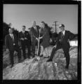 Group of men with one woman staging a ground breaking event for a Gold Medallion Home