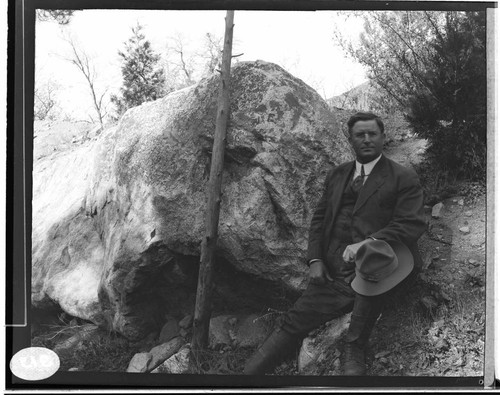 B.F. Pearson leaning up against the rocks