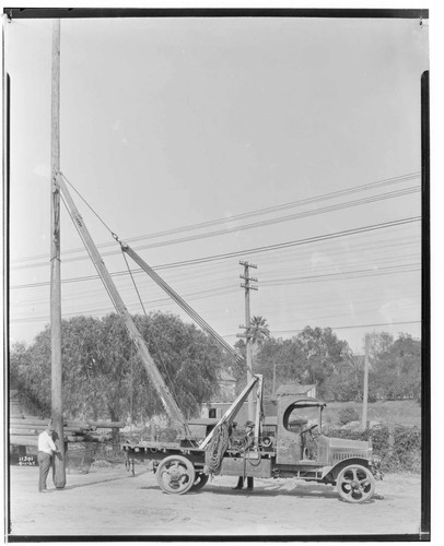 Truck and "Take Off" pole derrick