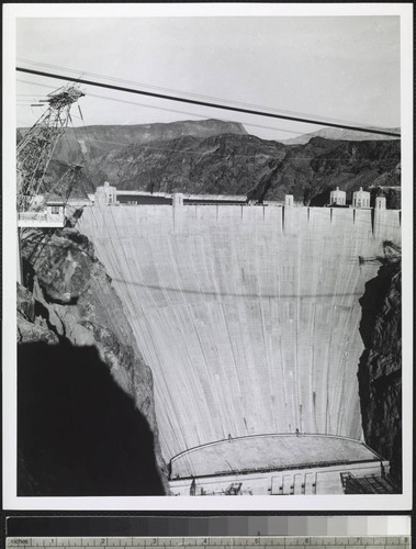 Hoover Dam spilling upstream view overhead showing Lake Mead and dam spilling on Nevada side