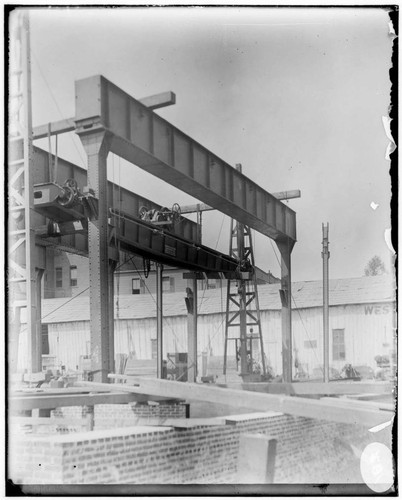 A construction crew working on the Fourth Street General Office building