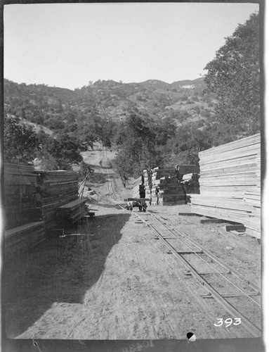 The lumber yard and tram at the construction site of Tule Plant