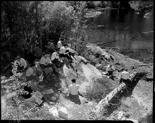 Big Creek tour group eating lunch by a lake