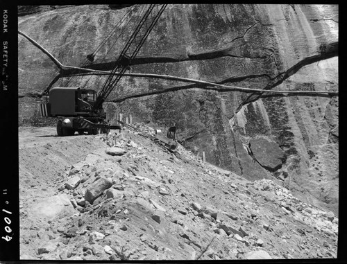 Big Creek - Mammoth Pool - Spreading downstream slope protection material