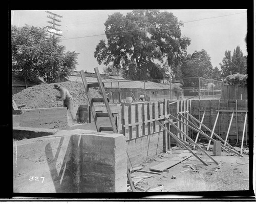 A construction crew working on the construction of the Visalia Local Office Building