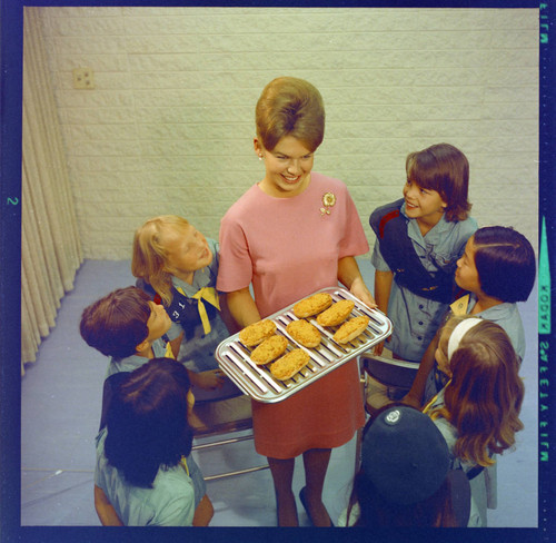 Home Economist Hillary Guild with group of Girl Scouts