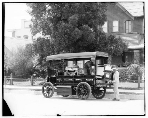 Unloading electric range at Long Beach residence from Electric Range Wagon #52