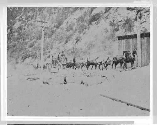 The delivery of material by horse drawn wagon to the building of Santa Ana River #1 Hydro Plant