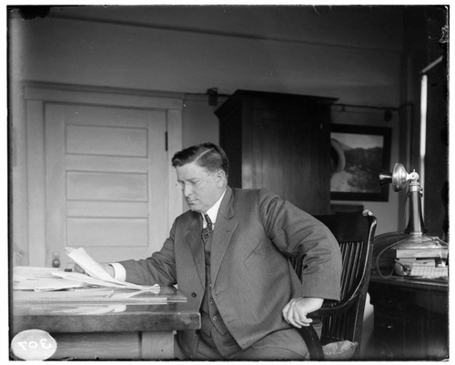 B.F. Pearson at his desk