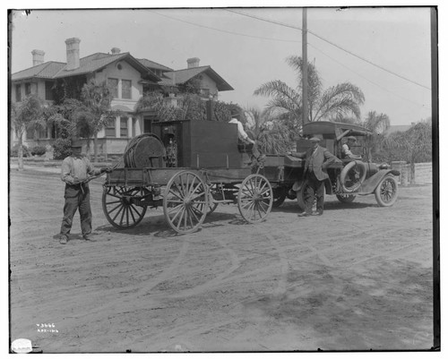 Men setting up portable substation at Santa Barbara